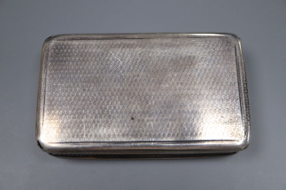 A William IV engine turned silver rectangular snuff box, Nathaniel Mills, Birmingham, 1830, 72mm (a.f.).